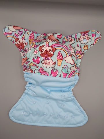 Cloth diaper SassyCloth one size pocket diaper with unicorn puppy cotton print.