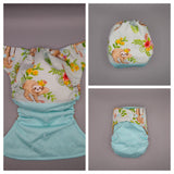 Cloth diaper SassyCloth one size pocket cloth diaper with sloth cotton print.