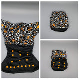 SassyCloth one size pocket cloth diaper with Halloween PUL print.
