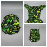 SassyCloth one size pocket cloth diaper with dinosaurs PUL print.