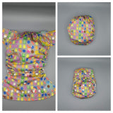 SassyCloth one size pocket cloth diaper with candy crush  PUL print.