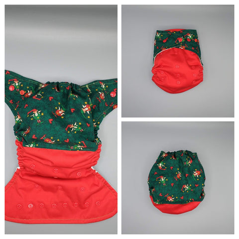 SassyCloth one size pocket cloth diaper with Christmas cotton print.