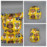 SassyCloth one size pocket diapers with floral animals cotton print.
