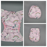 Cloth diaper SassyCloth one size pocket diaper with unicorns pink cotton print.