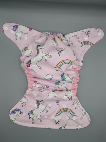 Cloth diaper SassyCloth one size pocket diaper with unicorns pink cotton print.