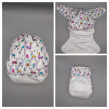 Cloth diaper SassyCloth one size pocket diaper with llamas white cotton print.
