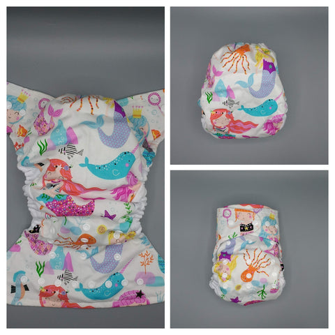 SassyCloth one size pocket cloth diaper with mermaids cotton print.