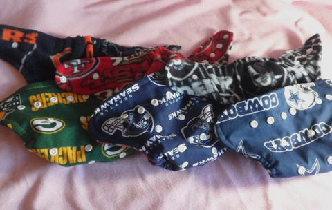 Choose your custom team and style cloth diaper.OS pocket diaper or cover with rival team inner,two teams combo or add ruffles. Made to order